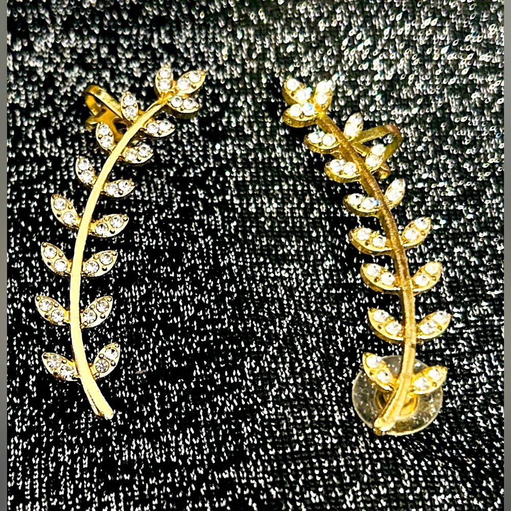 NWOT CLIMBER EAR CUFFS EARRINGS 14K GOLD PLATED WITH CZ’s . Lovely leaf motif .